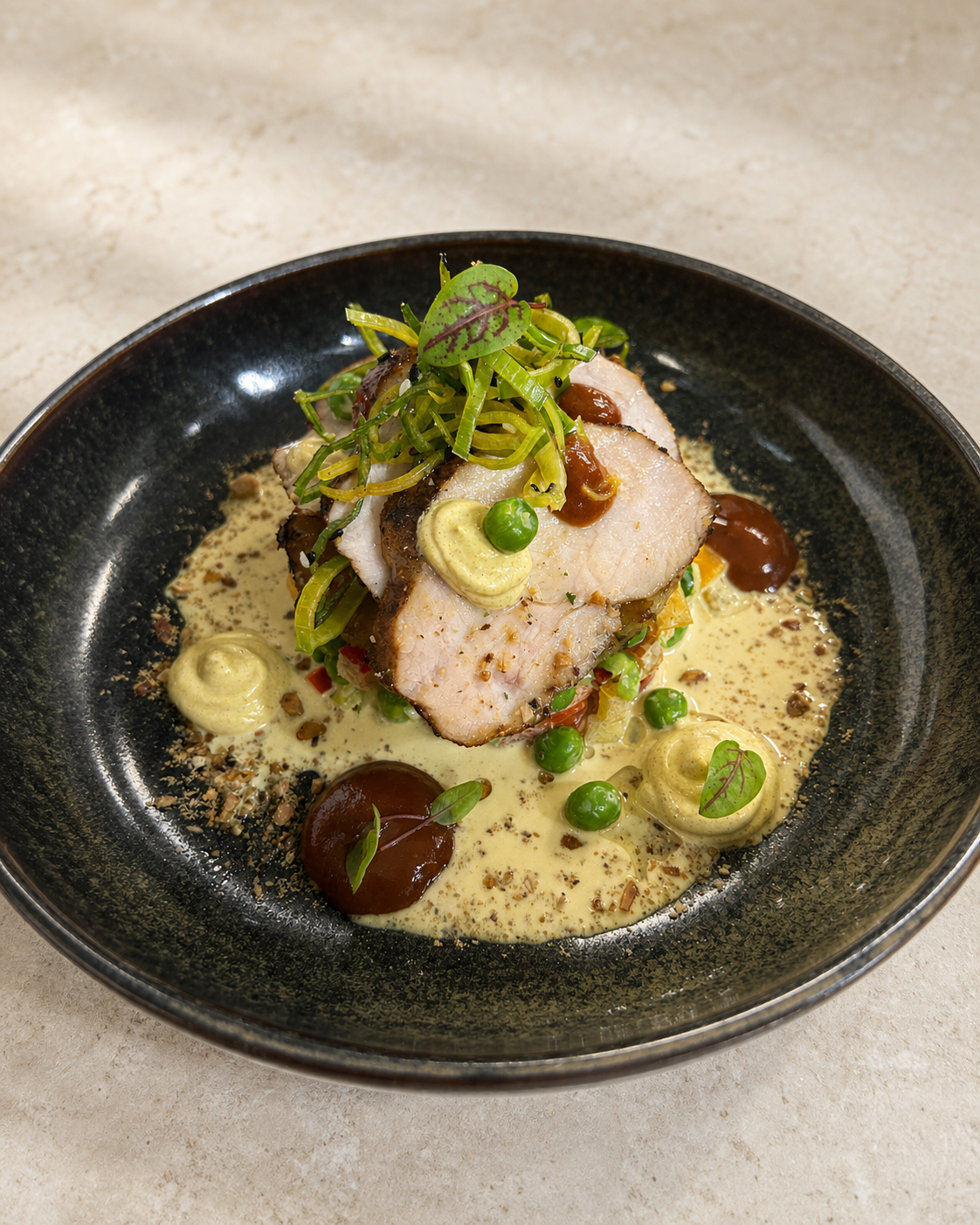 Pork with peas, leek and mustard sauce